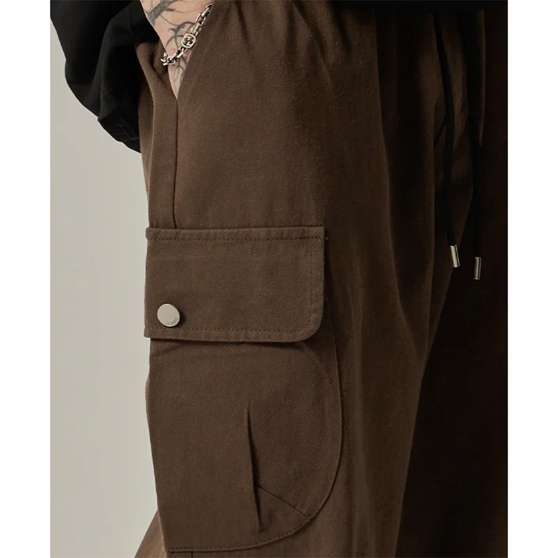 Calça de moletom masculina  primavera outono vintage japonesa perna larga reta solta botão bolsos grandes calças cargo calças com cordão